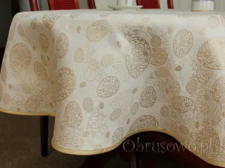 Owalny obrus wielkanocny 140x220 złote pisanki