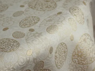 Owalny obrus wielkanocny 140x220 złote pisanki