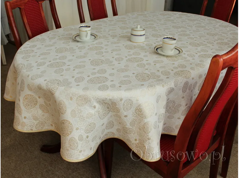 Owalny obrus wielkanocny 130x180 złote pisanki