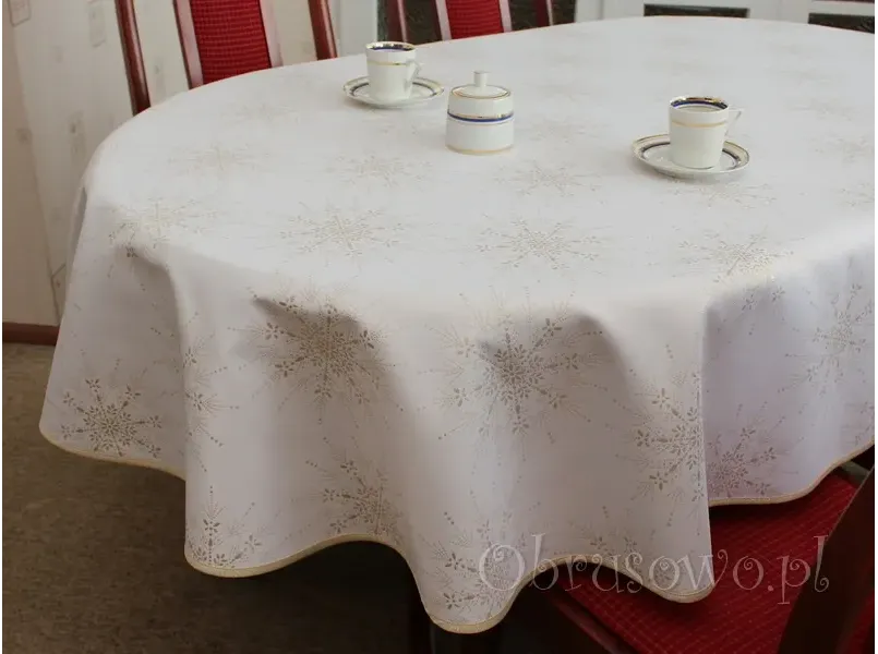 Owalny obrus świąteczny 130x180 złoty